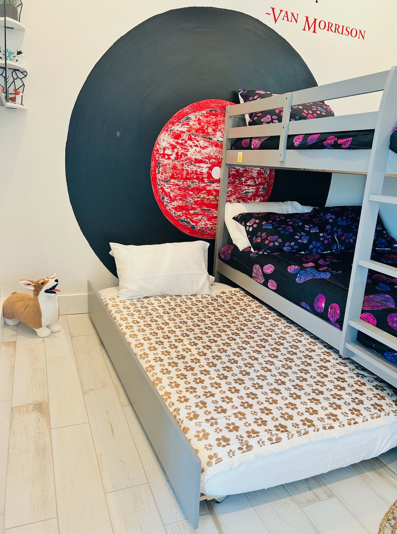 Music / disco room with vinyl mural, bunks, and trundle