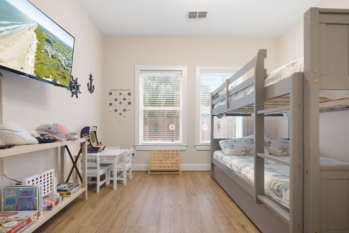 Bunk room with arcade