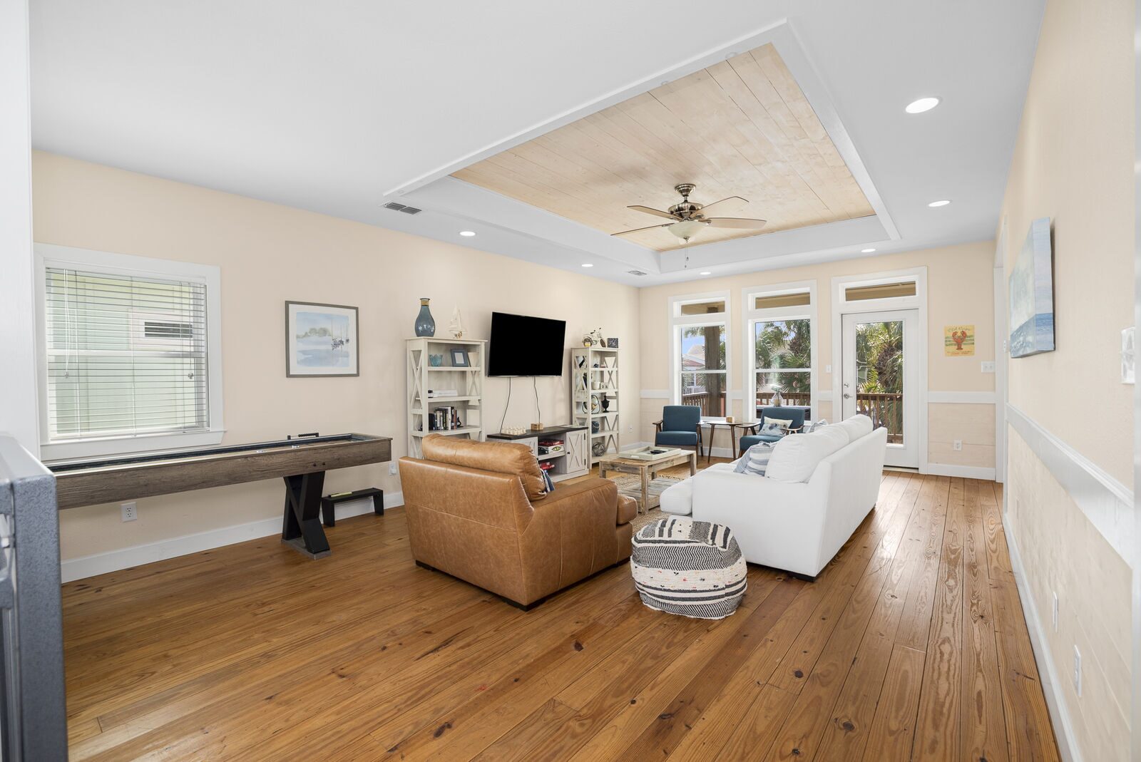 Living room with shuffleboard table
