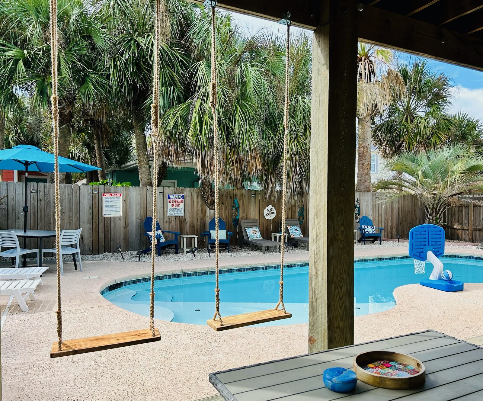 Poolside swings