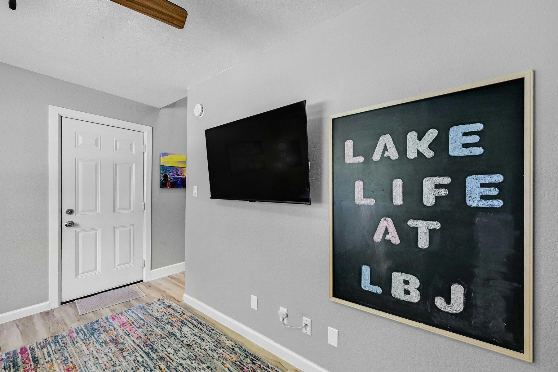 Lake Life at LBJ wall and TV in game lounge